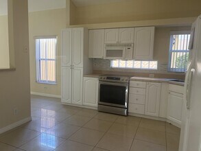 8008 Via Hacienda in Riviera Beach, FL - Building Photo - Building Photo