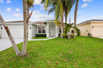 1209 Olympic Cir in Greenacres, FL - Building Photo - Building Photo