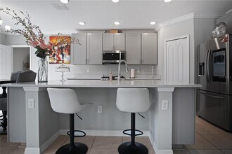 1171 Oak Bluff Dr in Davenport, FL - Building Photo - Building Photo