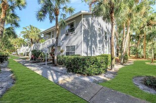 1965 Courtyard Way, Unit 106 in Naples, FL - Building Photo