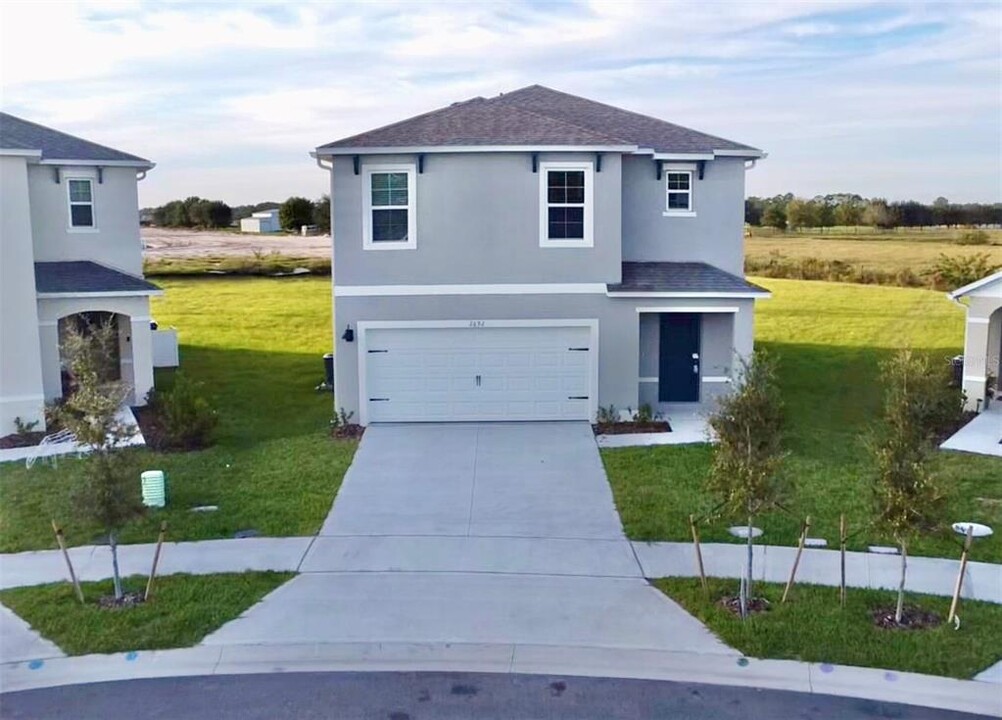 2692 Reddish Egret Bnd in St. Cloud, FL - Foto de edificio
