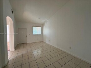 1568 SE 26th St, Unit 200 in Homestead, FL - Building Photo - Building Photo