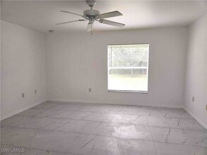 14980 Coopers Hawk Way in Ft. Myers, FL - Foto de edificio - Building Photo