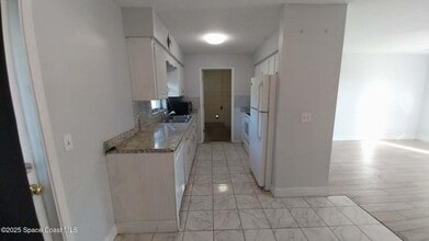 4180 Tom Ct in Mims, FL - Building Photo - Building Photo