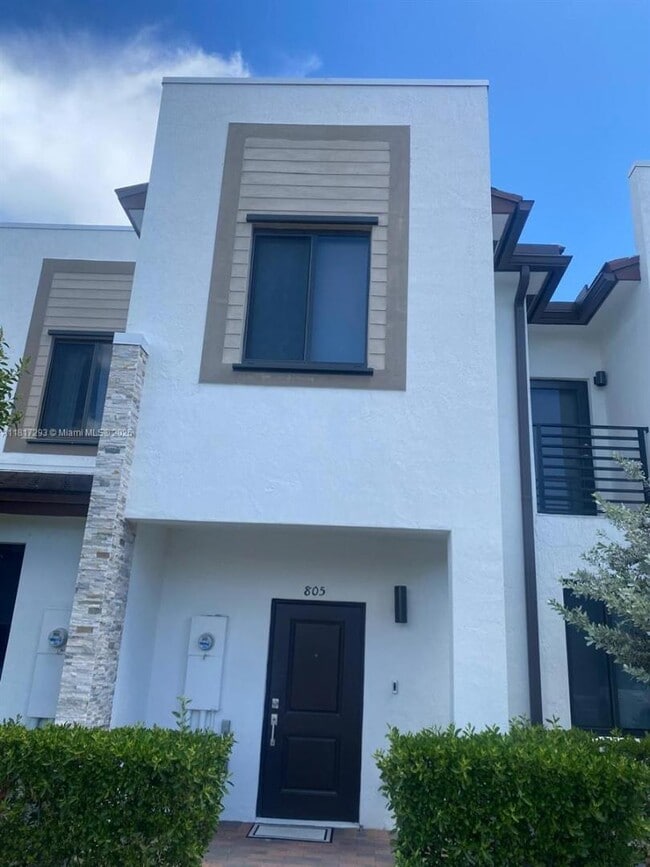 property at 805 NE 211th St