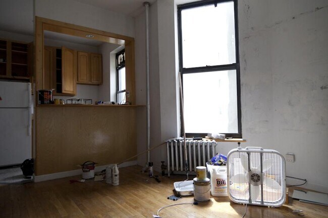 property at 68 E 1st St