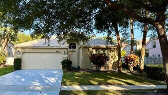 6166 Cotton Rose Ln in Greenacres, FL - Building Photo