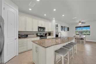 19912 Beverly Park Rd in Estero, FL - Building Photo - Building Photo