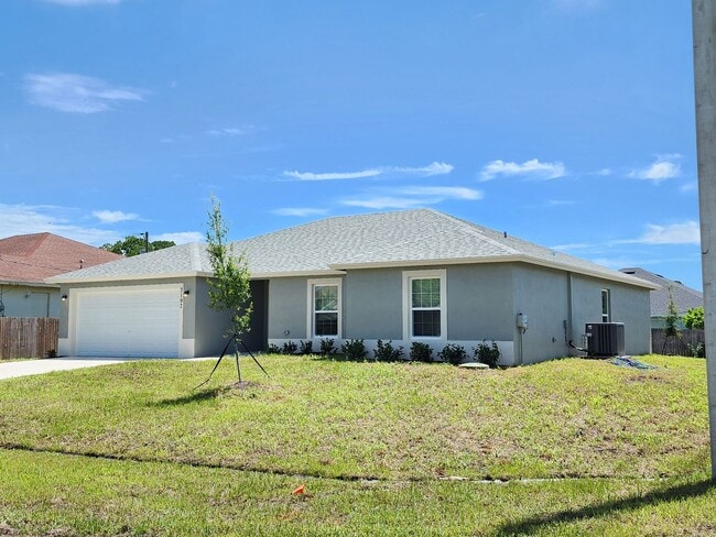 property at 3197 SW Armucher St