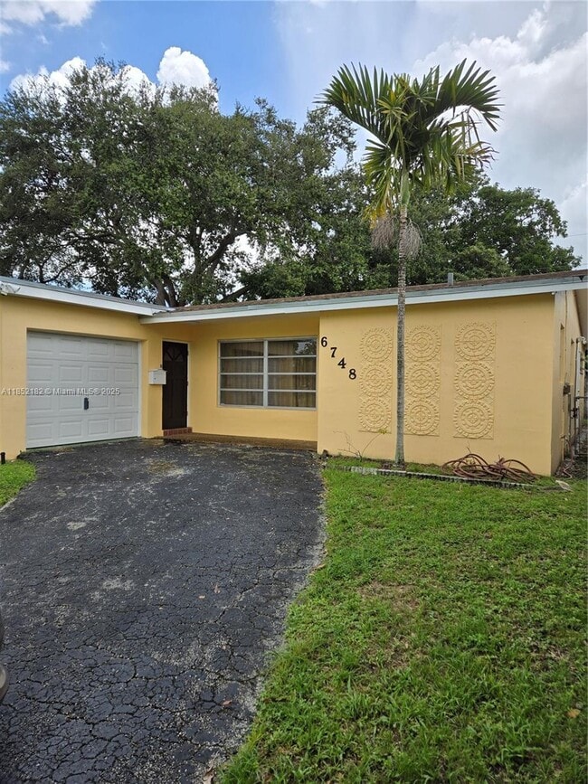 property at 6748 SW 34th Ct