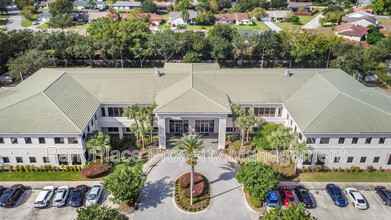 6000 Turkey Lake Rd in Orlando, FL - Building Photo - Building Photo