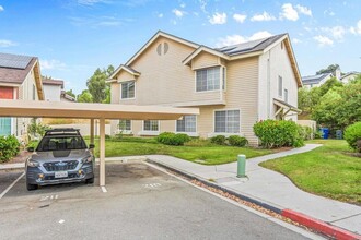 1461 Manzana Way, Unit 10-107 in San Diego, CA - Building Photo - Building Photo