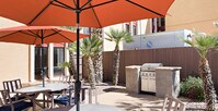 Lush BBQ in Pool Area - Wildcat Canyon Village Apartments in Tucson, Arizona