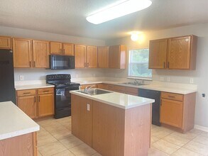 14138 Econ Woods Ln in Orlando, FL - Building Photo - Building Photo