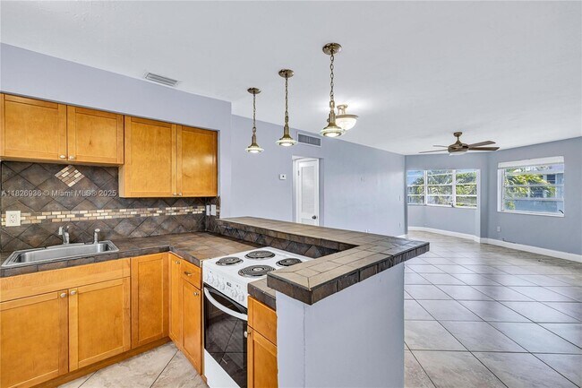 property at 1715 NE Miami Gardens Dr