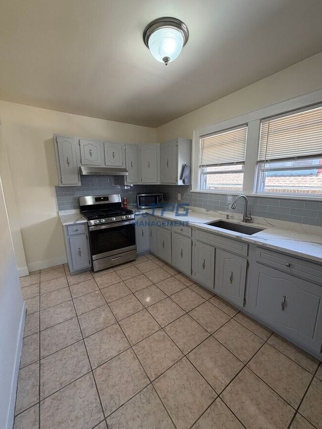 property at 318 E 19th St