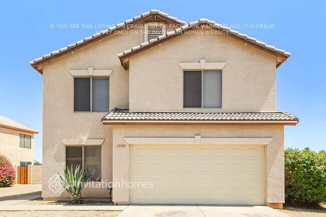 10307 W Denton Ln