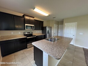 4610 Amaca Bay Ln in Melbourne, FL - Building Photo - Building Photo