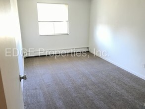 8828 E Florida Ave-Unit -APT 203 in Denver, CO - Building Photo - Building Photo