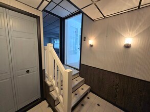 504 N Rath Ave, Unit 1 in Ludington, MI - Building Photo - Building Photo