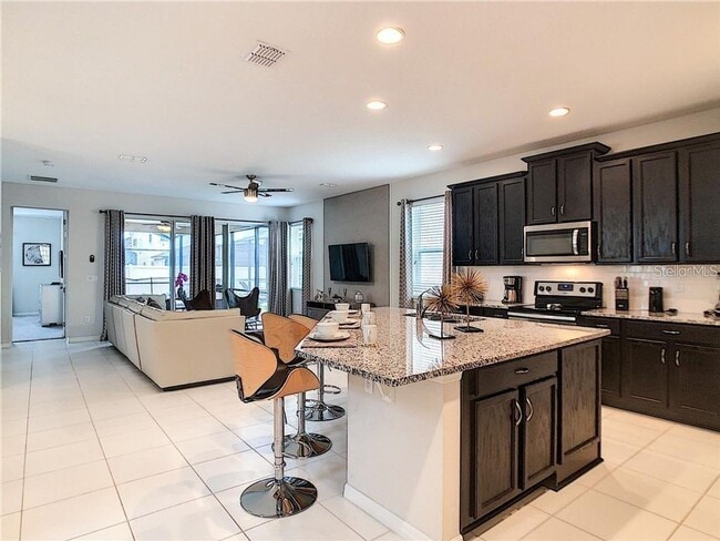 9009 Egret Mls Ter in Kissimmee, FL - Building Photo - Building Photo