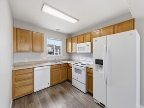 Spacious Townhome with Functional Layout in Evans, CO - Building Photo - Building Photo