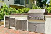 Barbecue Area - Village Pointe Apartments in Los Angeles, California