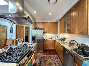 1437 W Olive Ave, Unit J04P in Chicago, IL - Building Photo - Building Photo