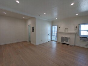 559 Normandie Ave, Unit 203 in Los Angeles, CA - Foto de edificio - Building Photo