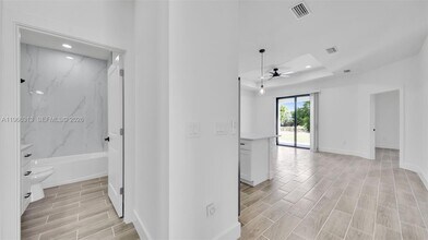 1123 Hightower Ave S in Lehigh Acres, FL - Building Photo - Building Photo