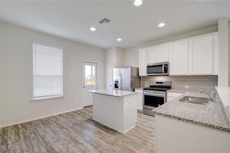 434 Eves Necklace Dr. in Mustang Ridge, TX - Building Photo - Building Photo