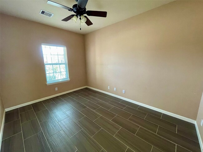 10803 Woodwind Shadows Dr