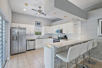 6051 Kendrick St in Jupiter, FL - Building Photo - Building Photo