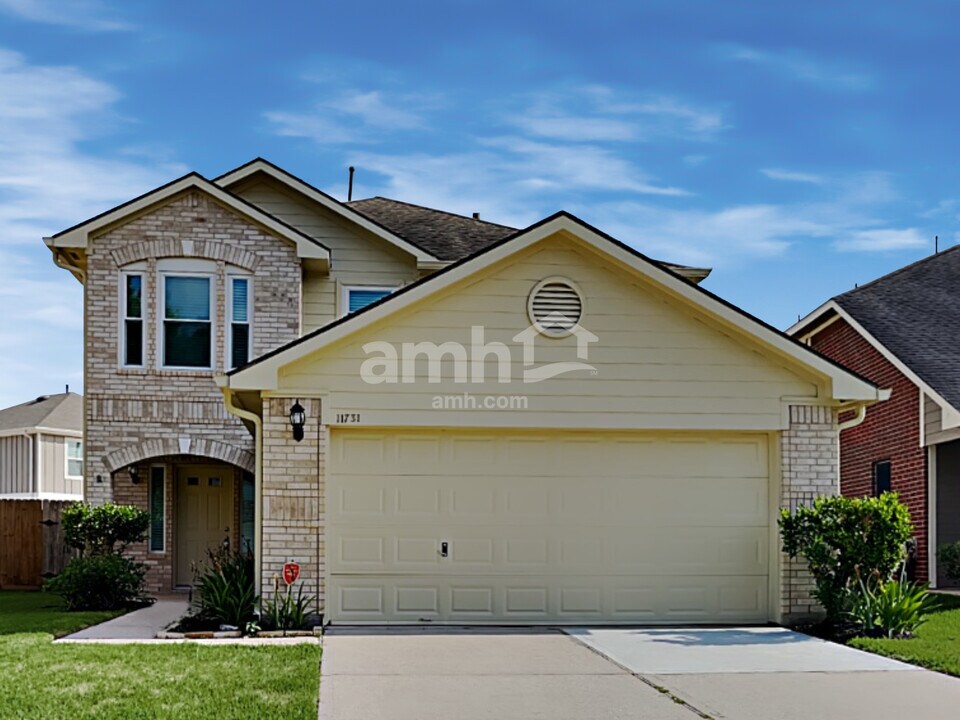 11731 Rolling Stream Dr in Tomball, TX - Building Photo