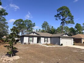 12253 Island Shrike Rd in Brooksville, FL - Building Photo