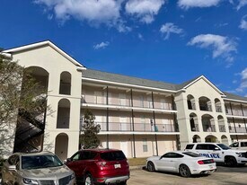 12386 River Highlands Dr, Unit S in Saint Amant, LA - Building Photo