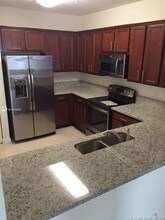 10600 NW 88th St-Unit -1A0 in Doral, FL - Building Photo - Building Photo