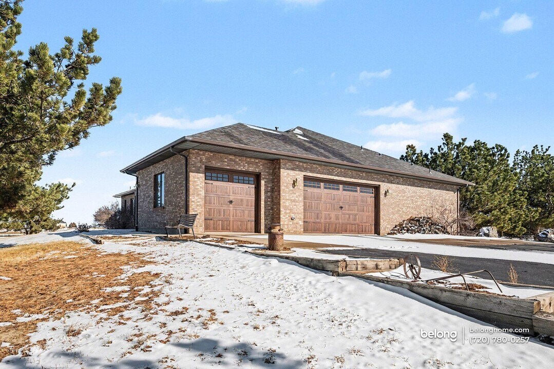 1050 S Manila Rd in Bennett, CO - Building Photo