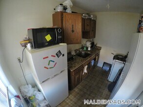 349 Pleasant St, Unit B1-11 in Malden, MA - Building Photo - Building Photo