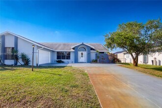 5402 NW Emblem St in Port St. Lucie, FL - Building Photo - Building Photo