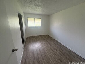 98-1370 Koaheahe Place Unit 164 in Pearl City, HI - Building Photo - Building Photo