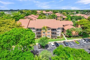 8721 Wiles Rd, Unit Unit #103 in Coral Springs, FL - Building Photo