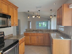 14807 Crooked Pond Ct in Ft. Myers, FL - Foto de edificio - Building Photo