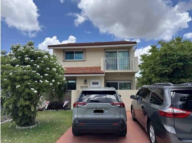 property at 11711 SW 13th St