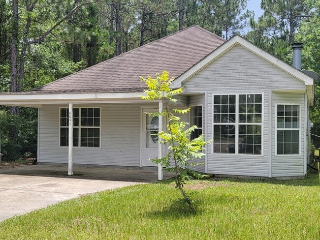 property at 6095 E Lamar St