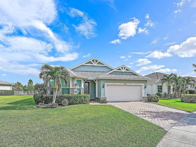 property at 12947 SW Aureolian Ln