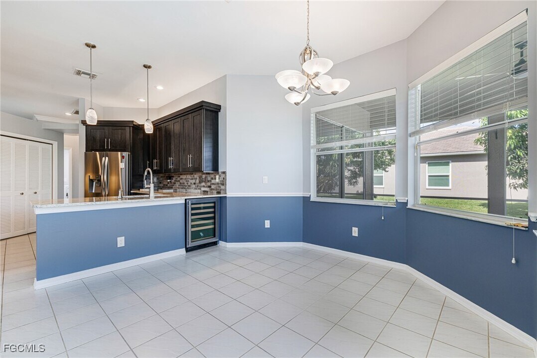 12986 Kedleston Cir in Ft. Myers, FL - Building Photo