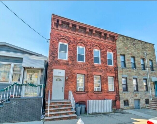 property at 128 W 20th St