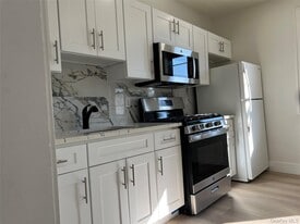 28 Walt Whitman Rd in Huntington Station, NY - Building Photo