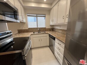 11937 Darlington Ave in Los Angeles, CA - Building Photo - Building Photo